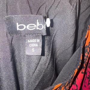 Bebe Elegant Rust and Copper Dress. 👗 cute dresses for any occasion